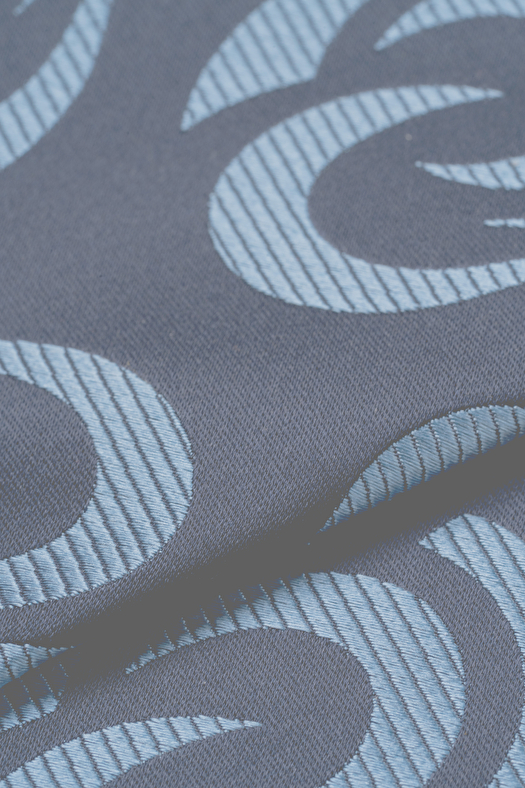 Cravatta jacquard in seta con disegno geometrico deco  