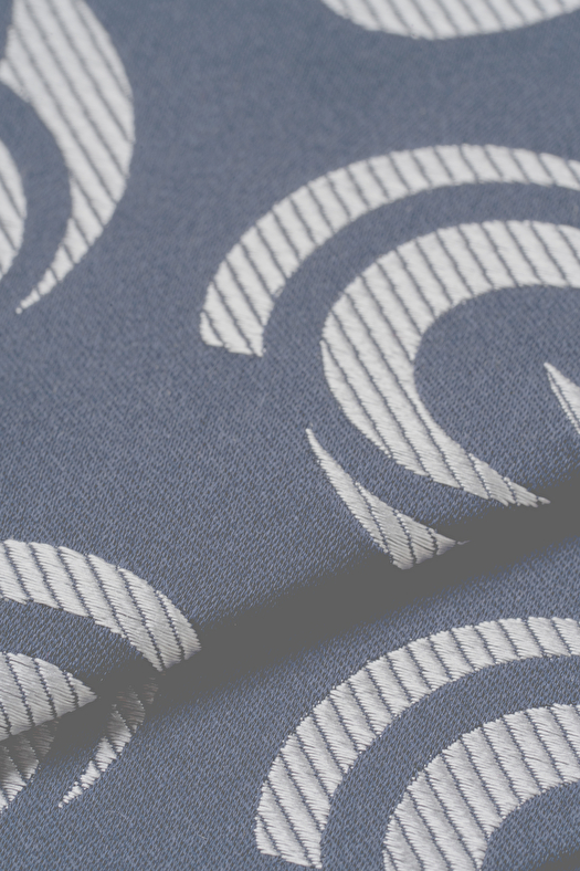 Cravatta jacquard in seta con disegno geometrico deco  