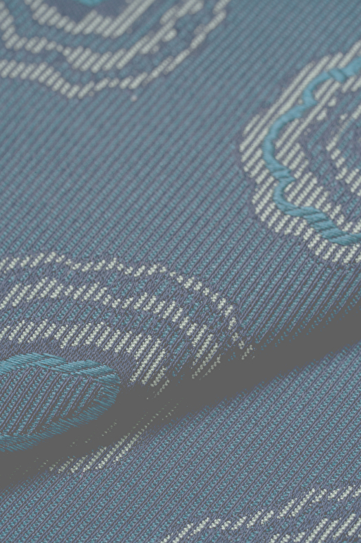 Cravatta jacquard in seta con disegno geometrico deco  